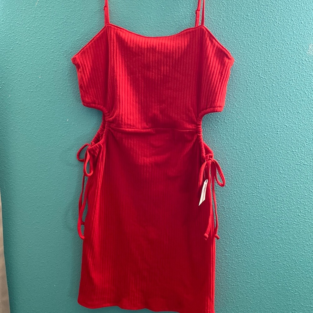 Red ribbed mini dress with cut out sides